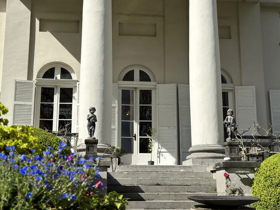 Columns, statues and flowers on the castle terrace